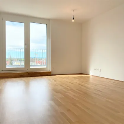 Wunderschöne Dachgeschosswohnung mit grünem Weitblick - Bild 2