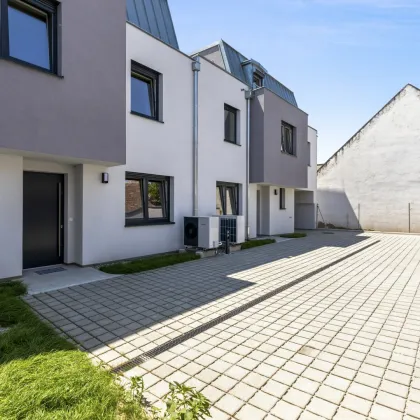 Familiengerechte Einfamilienhäuser komplett in ZIEGEL-Massivbauweise - mit Doppelgarage und schöner Dachterrasse mit Aussicht! - Bild 3