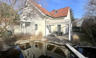 EXKLUSIVES, GEPFLEGTES EINFAMILIENHAUS IN IDYLLISCHEM GARTEN