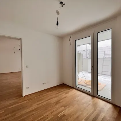 Neuer Preis!!! Erstbezug mit Terrasse! Moderne, toll aufgeteilte 2 Zimmer Wohnung im EG für nur 299.000€! Top 1 /B - Bild 3