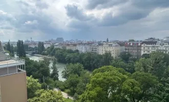 3 Zimmer Dachgeschosswohnung mit Blick über die Stadt