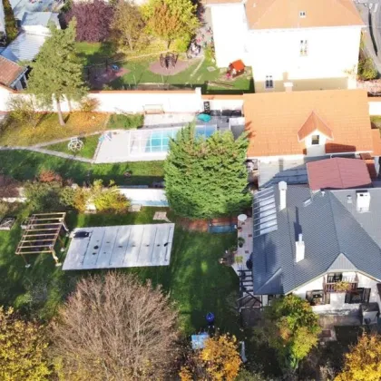 Gepflegter Familienhit mit großzügigem Garten und Pool in Mauer - Bild 3