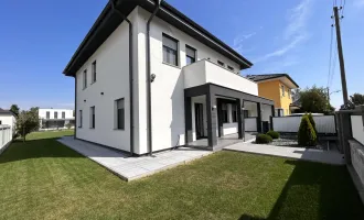 Luxus & alles was das Herz begehrt!  Neues Einfamillienhaus mit 600m2 Garten, und 2 Balkonen!