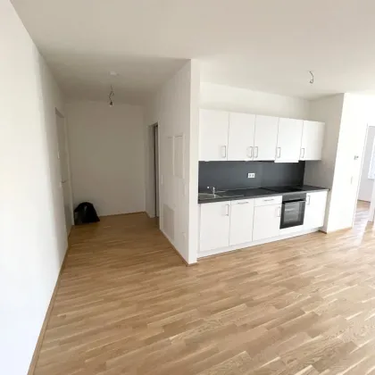 Blick in's Grüne genießen – helle 2-Zimmer-Wohnung mit Loggia - Bild 3