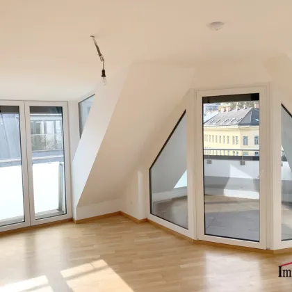 Moderne Dachgeschosswohnung mit traumhaften Ausblick! - Bild 3