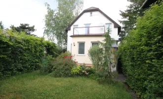 Einfamilienhaus mit Garten und Garage in begehrter Lage von Wien - perfekt für Familien!