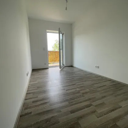 Einmalig - ersten 2 Mieten gratis -  65m² mit Balkon, Stellplätzen und top Ausstattung für nur 978,00 € Miete! - Bild 3