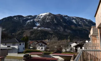 Exklusives Wohnerlebnis in den Bergen – moderne Dachgeschosswohnung mit traumhafter Aussicht!