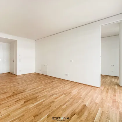 Mit Blick auf die Donau - Wohnung mit großem Balkon - offen und lichtdurchflutet - Nähe U1 Station Kaisermühlen - Bild 2