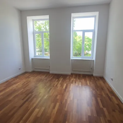 Wunderschöne Kleinwohnung mit neuer Küche und Parkblick - Bild 2