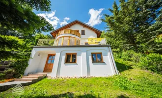 Einzigartiges Einfamilienhaus in wunderschöner Hanglage