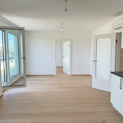 Provisionsfrei: 69m² DG-Erstbezug + 49m² Terrasse mit 3 Zimmern und Einbauküche - 1140 Wien - Bild 2