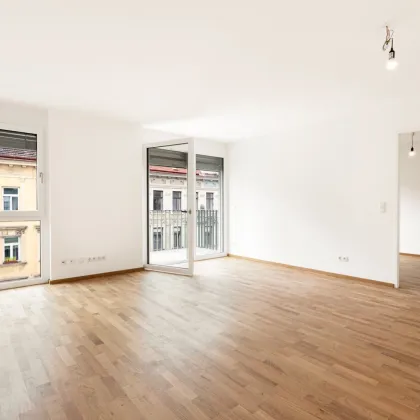 BEZUGSFERTIG |  2-Zimmer Neubau-Erstbezug mit Balkon | Fernwärme | TG-Stellplatz optional | Nachhaltiges Wohnbauprojekt - Bild 2