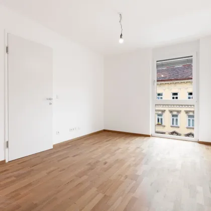 ERSTBEZUG | 2-Zimmer Neubau mit ca. 6 m² LOGGIA | Fernwärme | TG-Stellplatz optional | Nachhaltiges Wohnbauprojekt - Bild 3