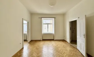 Balkonoption! Hofseitiger Zwei-Zimmer-Altbau im 3. Stock