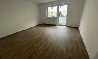 Erdgeschosswohnung mit Balkon!