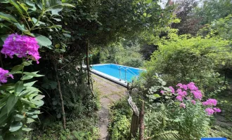 Stilvolles Einfamilienhaus mit Pool und Gartenoase