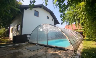 Moderne Eleganz in Wiens grüner Oase - Traumhaftes Einfamilienhaus mit Pool und  Garage