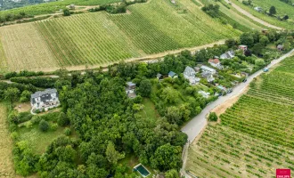 Premium-Lage am Nussberg: Baugrundstück mit genehmigter Doppelhaushälfte