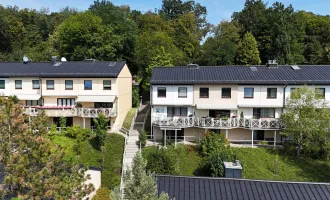 Reihenhaus an der Stadtgrenze mit Eigengarten, Garagenplatz und riesigem Gemeinschaftsgarten