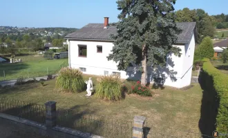 Unterkellertes Einfamilienhaus mit Garage in schöner Wohnlage