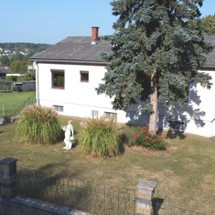 Unterkellertes Einfamilienhaus mit Garage in schöner Wohnlage - Bild 2