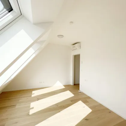 Erstbezug: Helle DG-Wohnung mit atemberaubendem Ausblick und großzügiger Dachterrasse - Bild 3