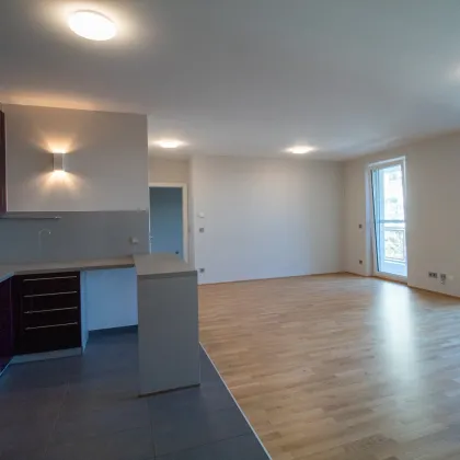 EXKLUSIVES Wohnen in Baden: Moderne 3-Zimmer-Wohnung mit Balkon, Garage und Fußbodenheizung - jetzt mieten! - Bild 3