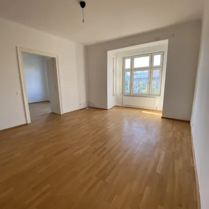 Tolle 3,5 Zimmerwohnung mit Loggia und allg. Garten neben U4 Station - Bild 2