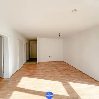 Traumhafte Wohnung mit Weitblick und 1 Carport Stellplatz-Haus 2 Top 6 - Bild 2