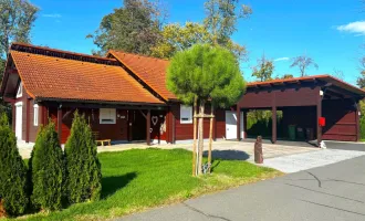 Massiv gebautes Holzhaus, Garage, D-Carport, überdachte Terrasse und Garten zu vermieten