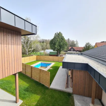 Erstbezug, schlüsselfertige Neubauwohnung mit Eigengarten und Pool Top 5 - Bild 2