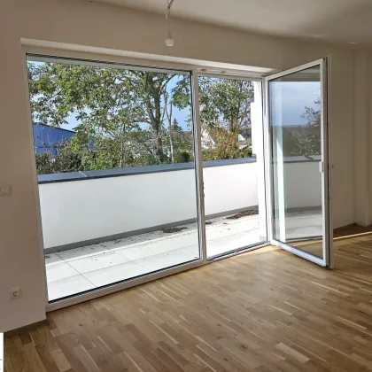 Erstbezug: Moderne Wohnung mit Balkon, Stellplätzen & hochwertiger Ausstattung für nur 260.000€ in Marchtrenk! - Bild 2