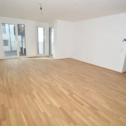 Mega cool! Moderne 3-Zimmer-Neubauwohnung mit Balkon im Erstbezug! Hofruhelage! - Bild 2