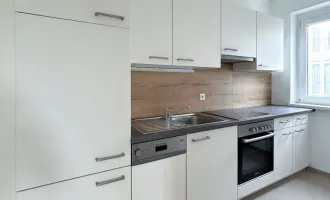 geräumige Wohnung mit großzügigem Balkon, Küche ohne Ablöse und Tiefgaragenabstellplatz + 2 Monate Mietfrei!!