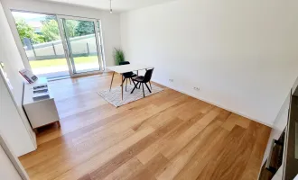 Neuer Preis! Die ideale Kleinwohnung mit Garten! Kleine Wohnung mit viel Freiraum! Traumhafter Eigengarten und Terrasse + Stylische Einbauküche + Grün wohin das Auge reicht + Luftwärmepumpe!