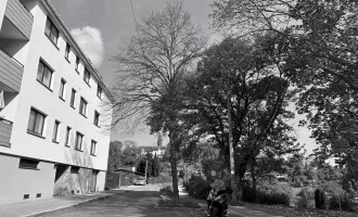 Gemeinschaftsgarten, Garagenstellplatz - Neubauwohnung mit Loggia