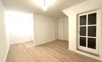 1190! Generalsanierte 2-Zimmer Wohnung mit kleiner Terrasse und neuer Küche ab Dezember 24!