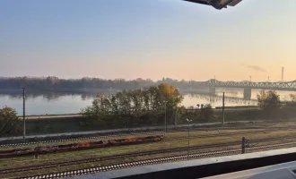 "Luxuriöses Wohnen mit Blick auf die Donau – Ihre neue Dachterrassenwohnung"